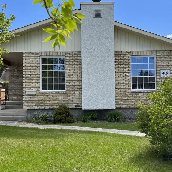 New picture windows on a Winnipeg home
