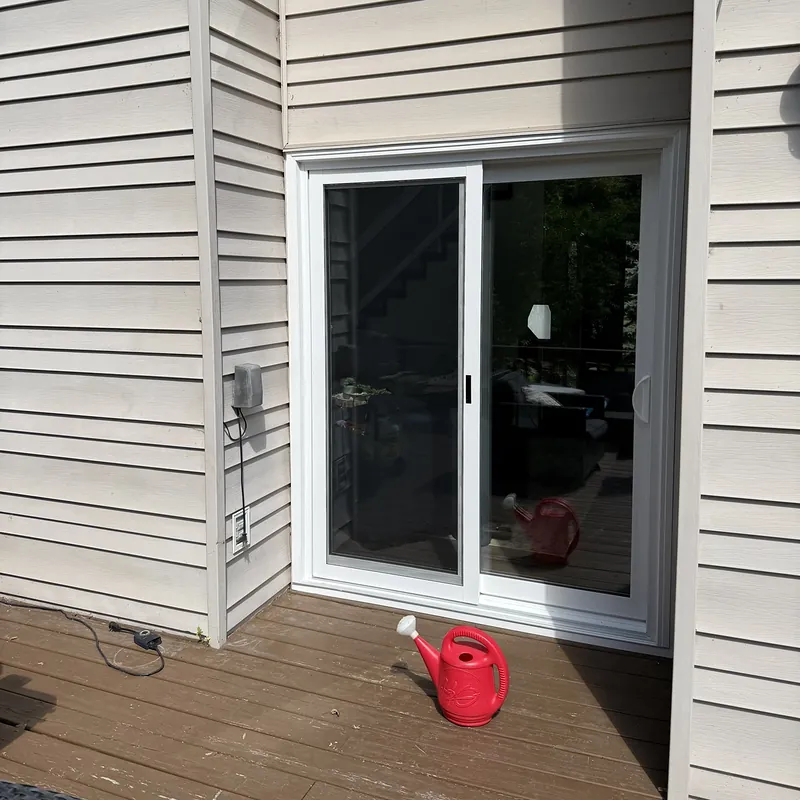 Sliding patio door on a back deck