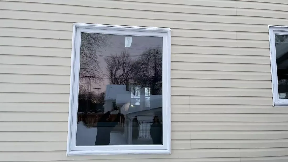 High-profile picture window on siding